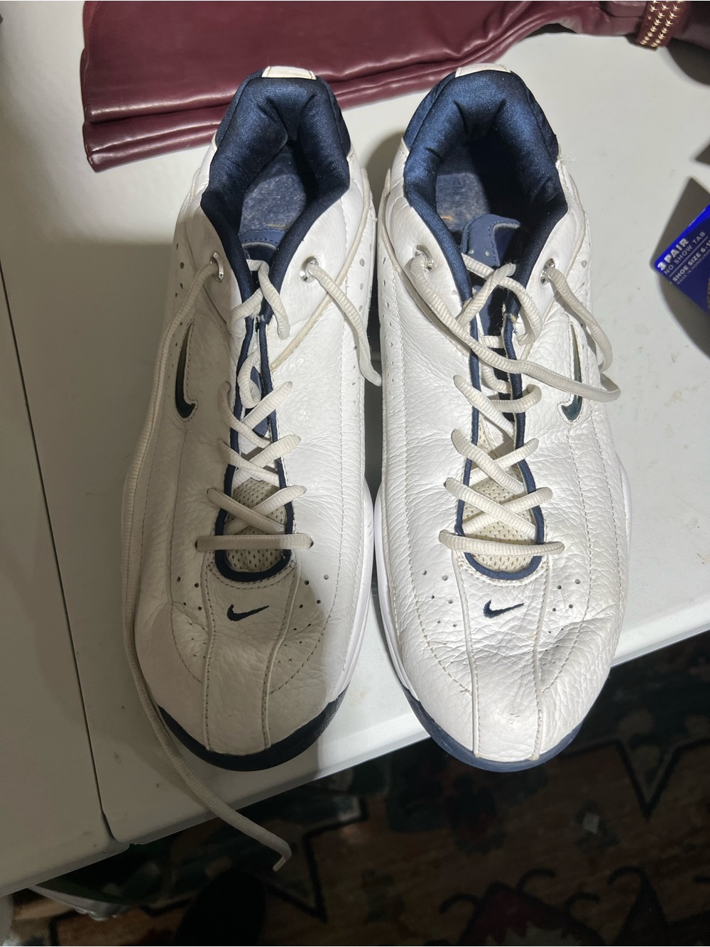 Nike Men’s White and Navy Leather Athletic Shoes
